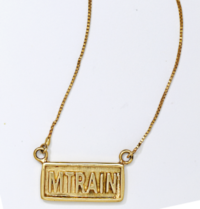 Music Friday: Meghan Trainor's 'MTRAIN' Necklace Stars in Her 'Me Too' –  Artistry in Gold